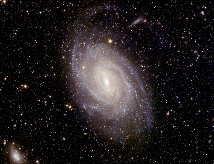 gigantic glowing spiral galaxy full of abundant stars