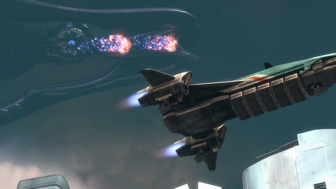 A spacecraft races past a massive Covenant ship in Halo: Reach