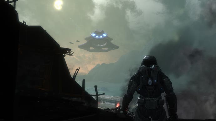 A Covenant ship hangs in the air as a Spartan watches in Halo: Reach