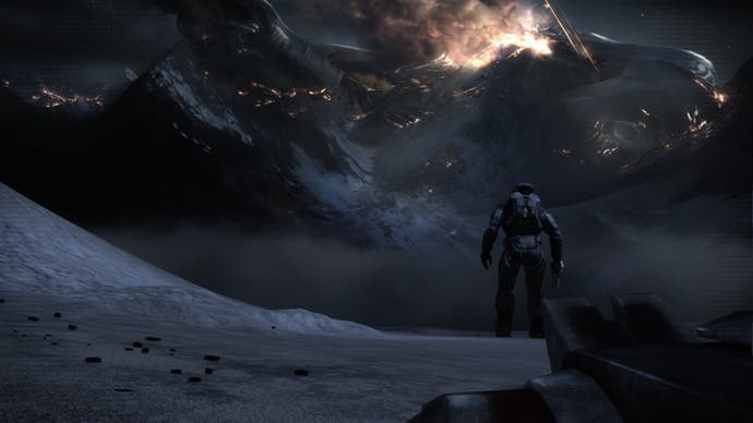 A Spartan stands in front of a mountain and looks at a flaming spaceship in the sky in Halo: Reach