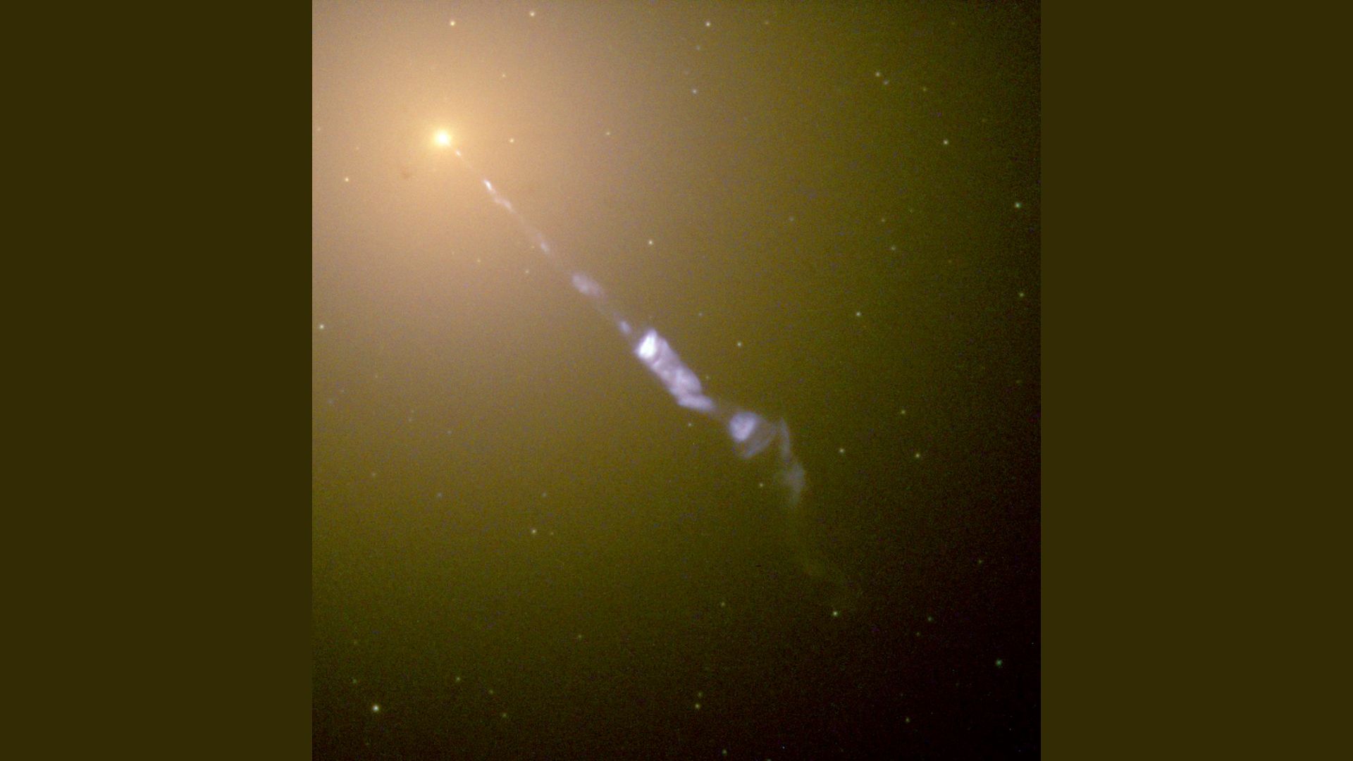     A photo of a jet from the core of a galaxy. 