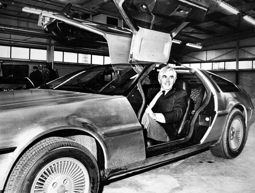 Cars: DeLorean/car designer John DeLorean in one of his gull wing models.