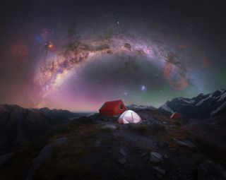 Milky Way arc photographed above a lonely camping tent atop Aoraki/Mt Cook National Park, New Zealand