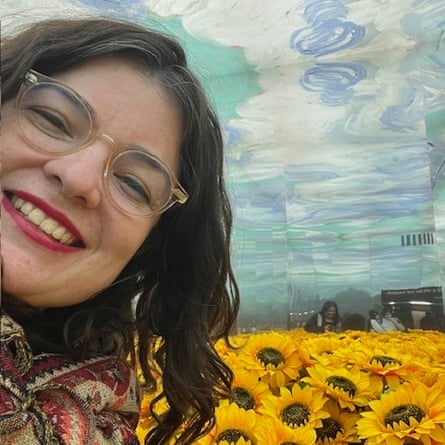 Candid photo or selfie of Jess Perriam in a field of sunflowers