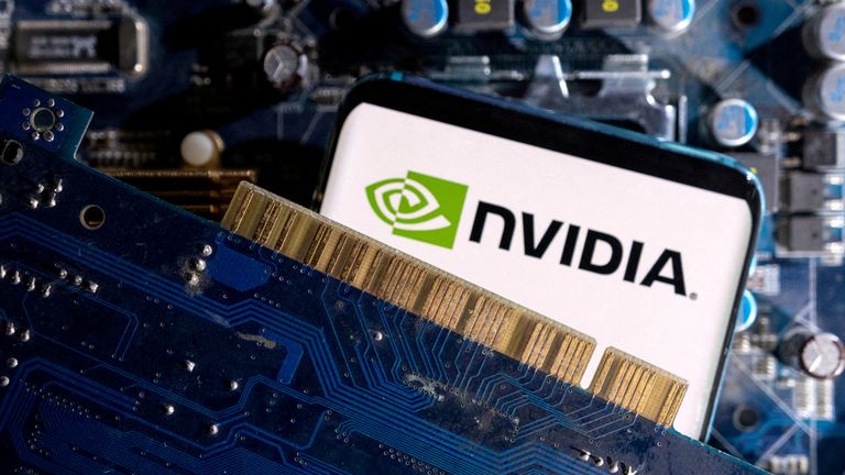 FILE PHOTO: A smartphone with a displayed NVIDIA logo is placed on a computer motherboard in this illustration taken on March 6, 2023. REUTERS/Dado Ruvic/Illustration/File Photo