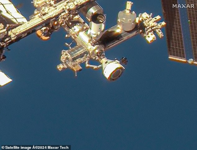 This image courtesy of Maxar Technologies, taken on June 7, 2024, shows the Boeing Starliner spacecraft docked in the forward port of the International Space Station (ISS) on the station's Harmony module.  Because Starliner is docked to the ISS, astronauts can still hop on and off Starliner whenever they want