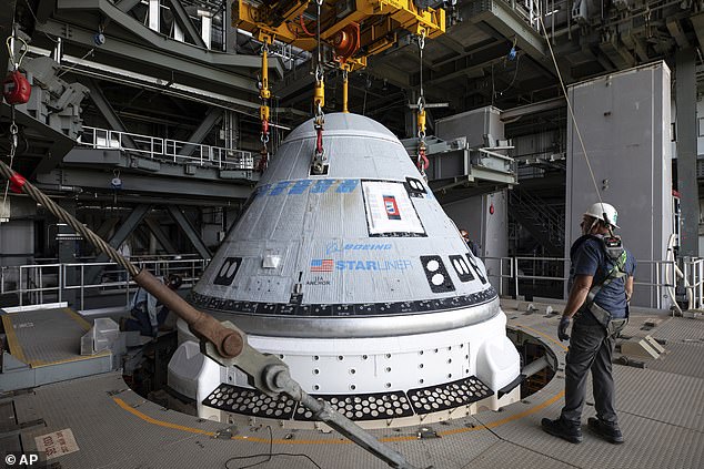 Starliner is lifted at the Vertical Integration Facility at Space Launch Complex-41 on Cape Canaveral Space Force Station in Florida, April 16, 2024