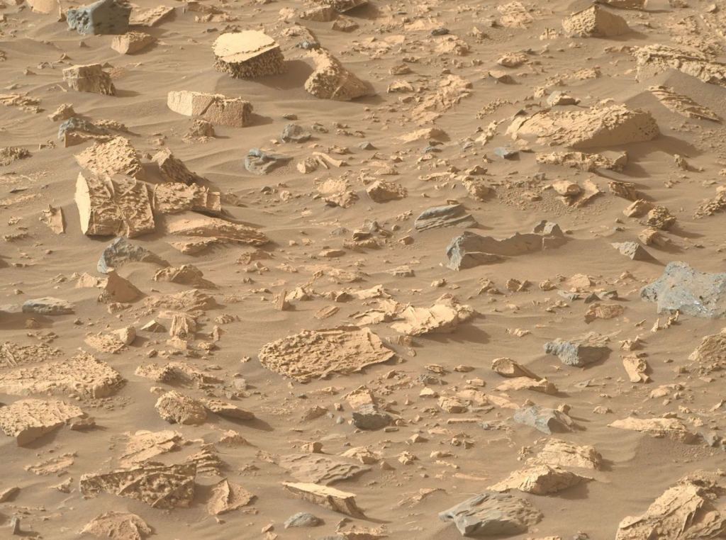 These rocks in Bright Angel have unusual popcorn-like textures and abundant mineral veins.  Image credits: NASA/JPL-Caltech/ASU