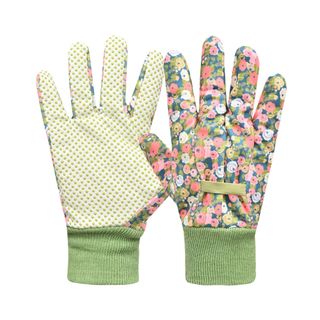 pair of garden gloves.  One side is cream colored with green dots and a green wristband, and the other side is floral with a green wristband