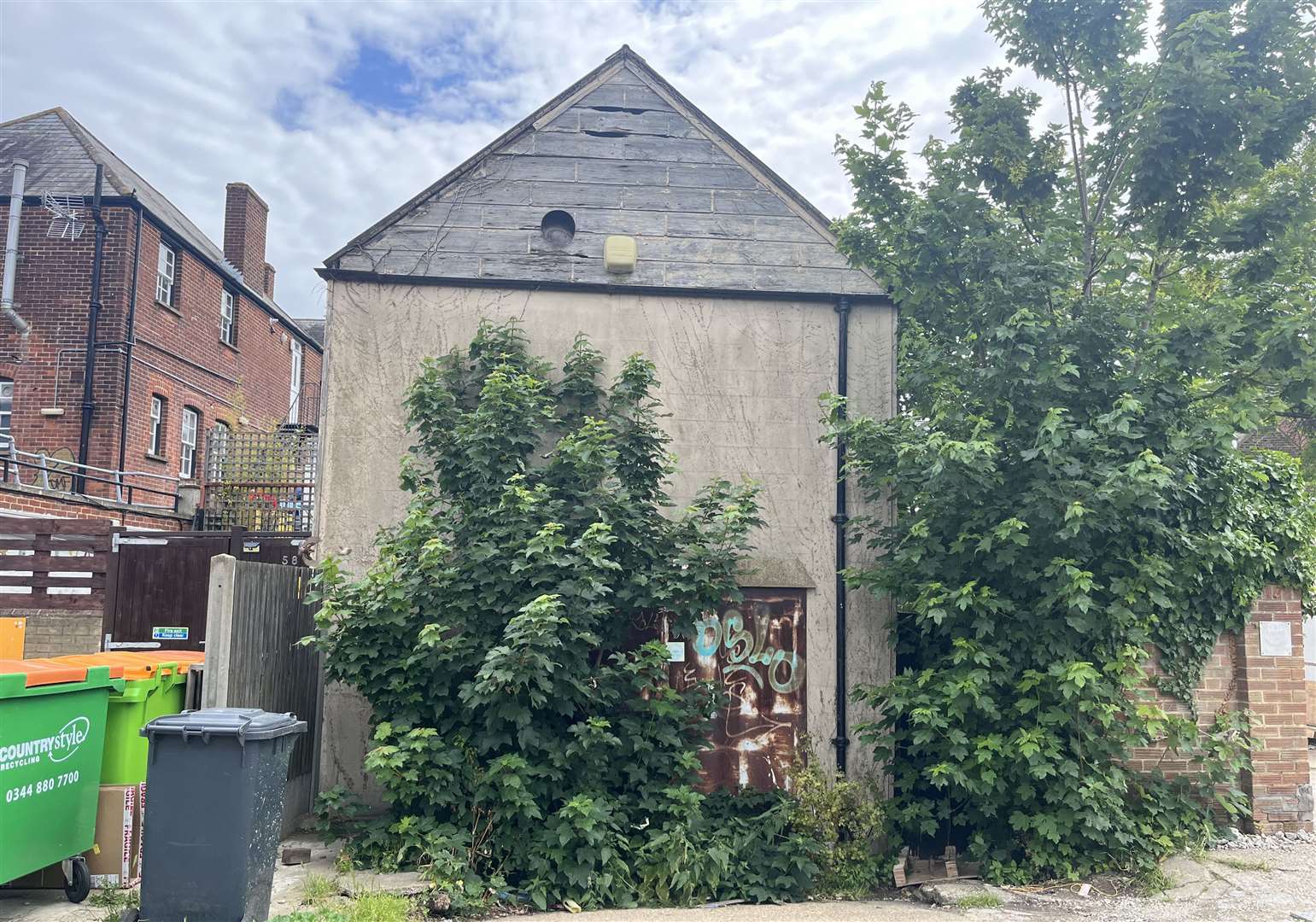 The old warehouse at the rear of the site on Whitstable High Street will be demolished as part of the three-apartment proposal