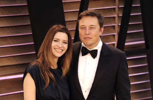 Actress Talulah Riley (L) and Tesla Motors CEO Elon Musk arrive at the 2014 Vanity Fair Oscar Party on March 2, 2014 