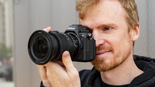 Nikon Z6 III camera held in front of the photographer's eye