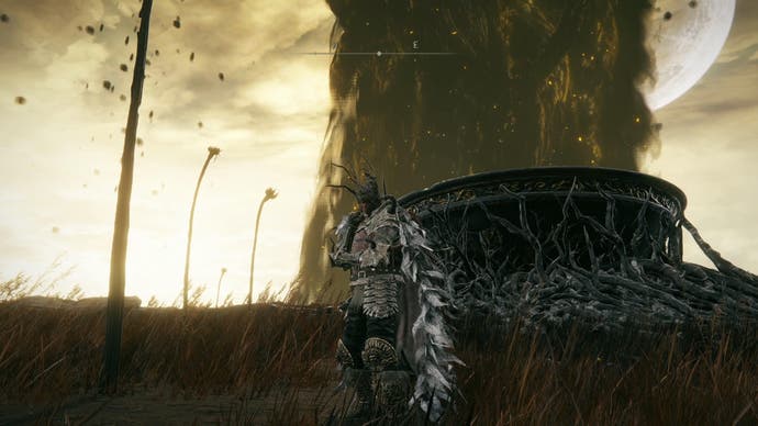 Screenshot from Elden Ring Shadow of the Erdtree showing the player character contemplating next to a giant stone chalice