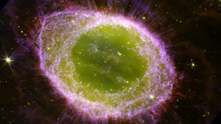 a pink and green gas cloud in space