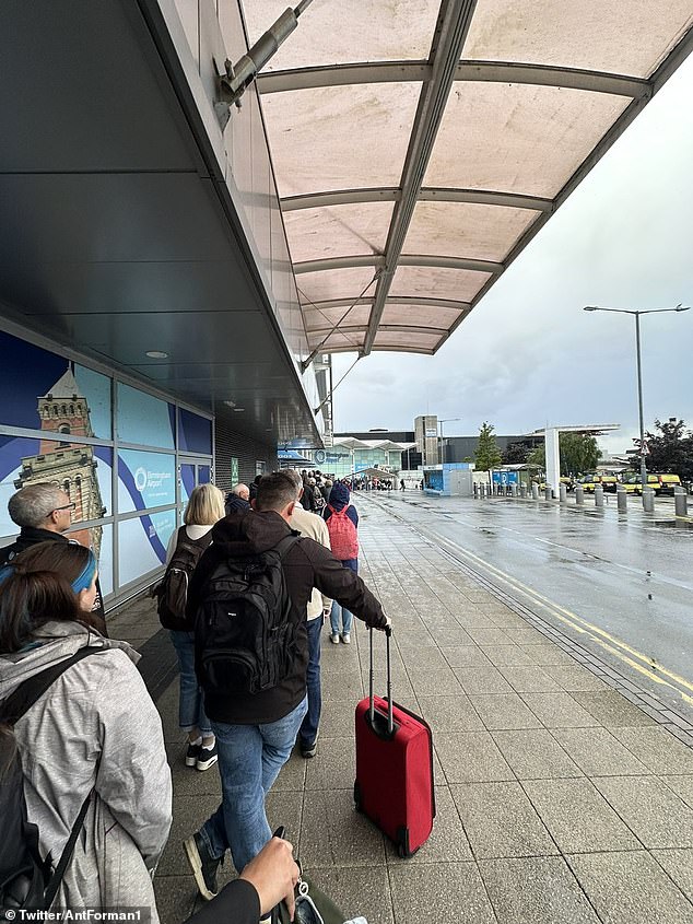 Huge queues at Birmingham Airport are still causing chaos for passengers on Monday morning