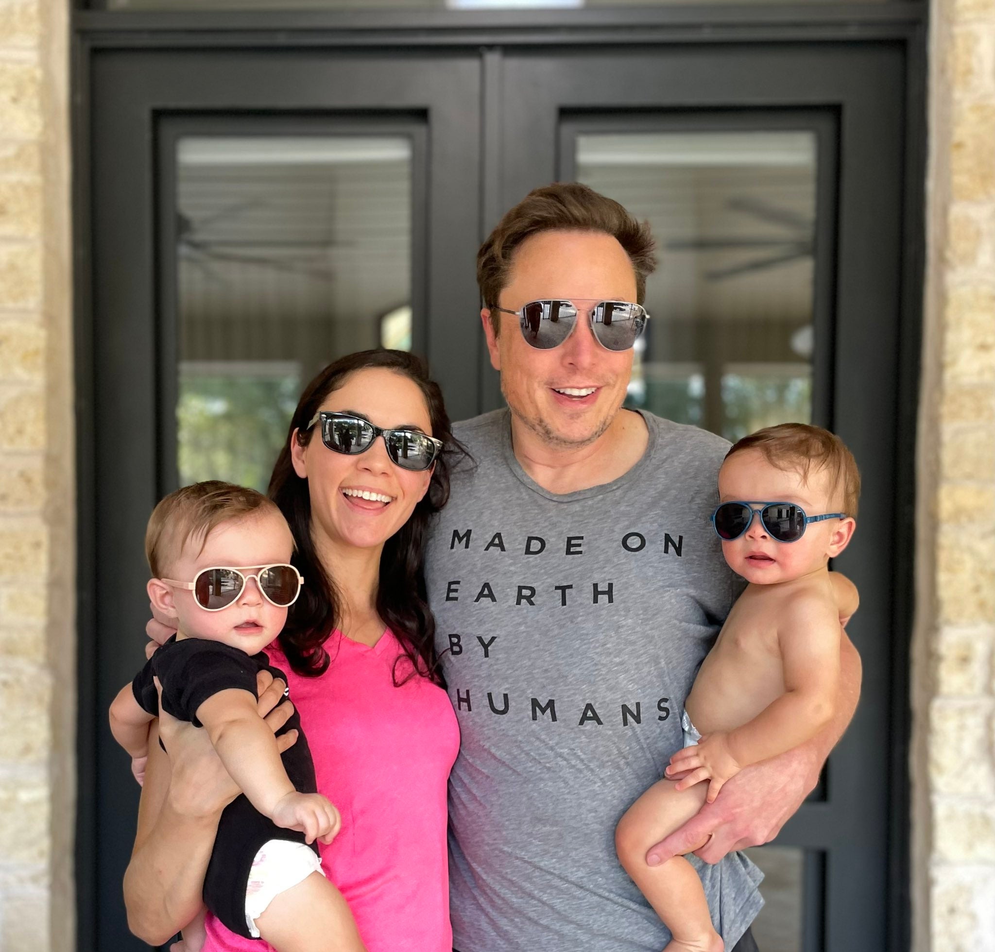 Elon Musk, Shivon Zilis and their twins.  Musk announced earlier this year that the couple welcomed a new baby