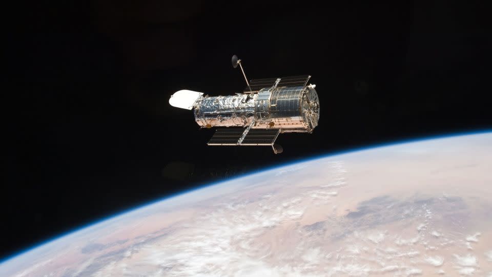 NASA's Hubble Space Telescope studies the universe in May 2009 after one of the Space Shuttle missions to the space observatory.  -NASA