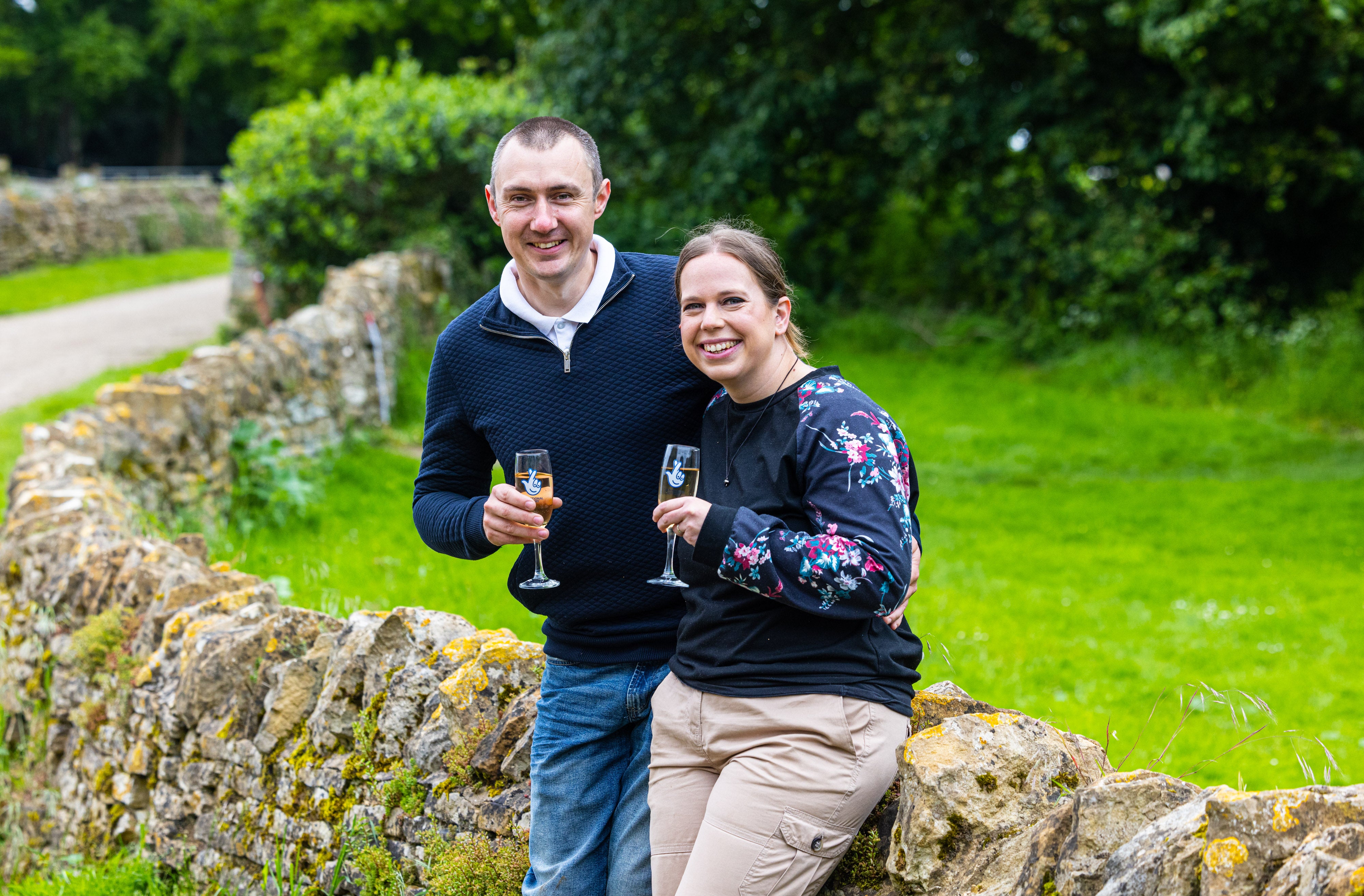 Graeme White, 35, and his wife, Katherine, 36, celebrate after their £1million EuroMillions win