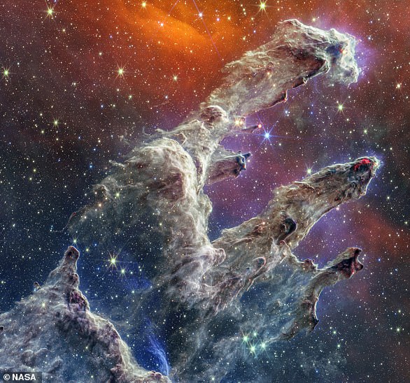 Resembling a ghostly hand, the Pillars of Creation are part of the Eagle Nebula – which lies 6,500 light-years from Earth – and are known as a source of star formation.