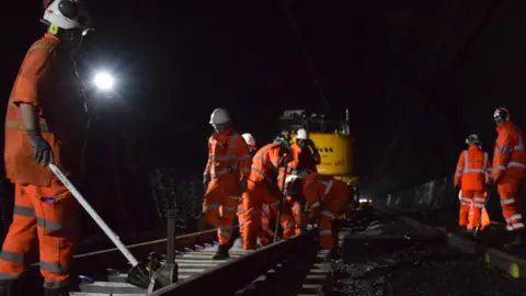 Network Rail Engineers lay new track in the Severn Tunnel