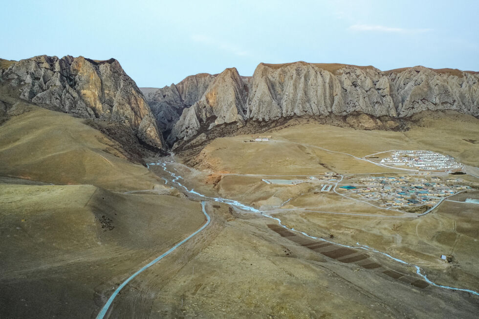 The Ganjia Basin is adjacent to the cliffs where the Baishiya Karst Cave is located.