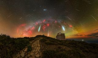 The Geminids meteor shower against a colorful sky full of stars.