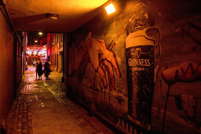 A mural in Belfast, Northern Ireland, depicting a pint of Guinness