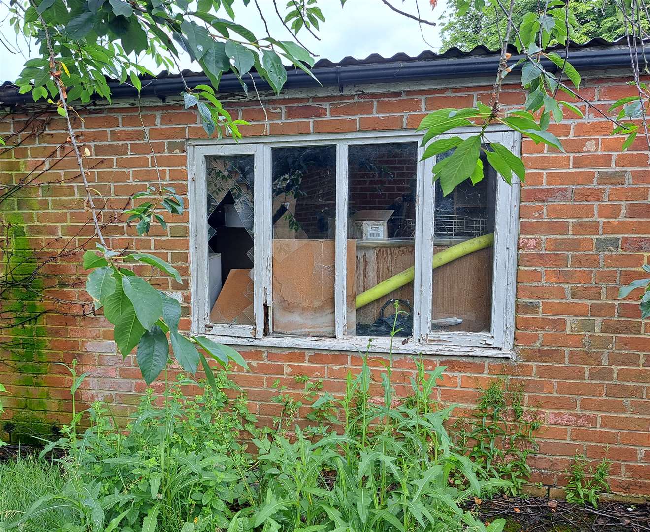 Vandals have smashed windows in the outbuildings of the Hadlow Manor Hotel