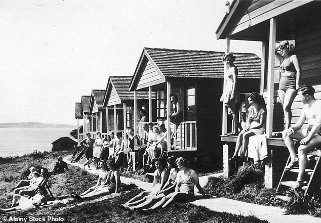 Guests outside the chalets at Pontins Holiday Camp, Osmington Bay, Dorset, in 1958