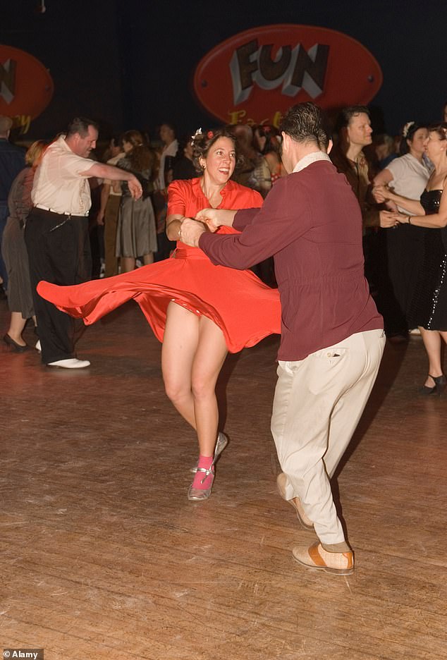 A man and a woman take to the dance floor during a Pontins 'Rhythm Riot Weekend' at the now-closed Camber Sands venue in Sussex