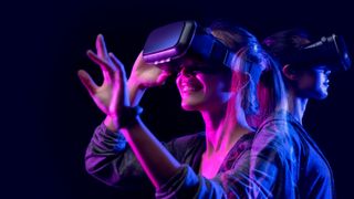 Teens have fun playing VR while wearing generic goggles