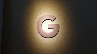 The Google logo in black and white under a sepia tint