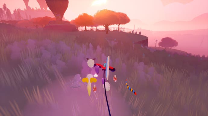 Sunset in Flock with a bright burning sky as the player and his/her flock approach a horizon filled with a clump of trees.