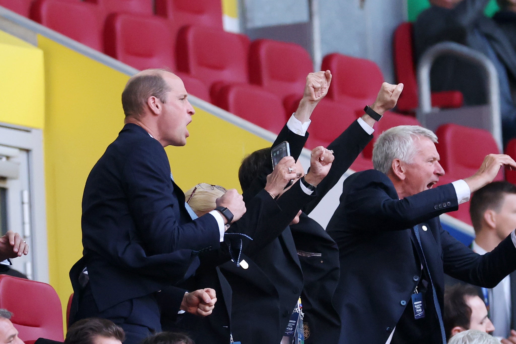 The Prince of Wales cheers on the England team