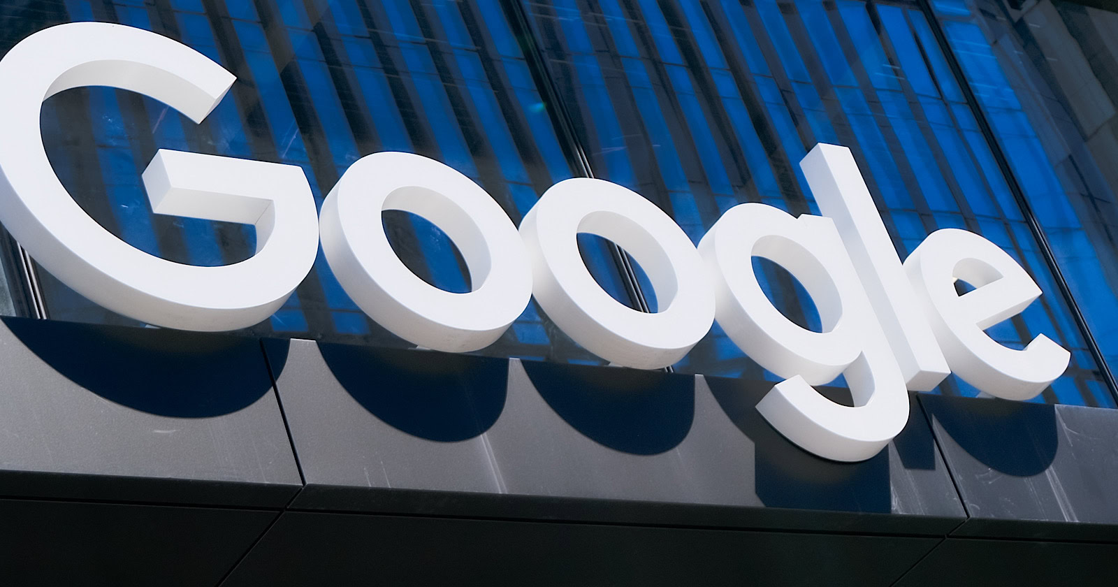 General view of the Google logo sign on an office building facade wall