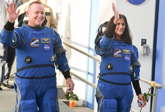 NASA astronauts Suni Williams and Butch Wilmore say goodbye to friends and family Wednesday, June 5, 2024, as they leave the astronaut crew quarters en route to the launch pad.